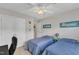Bedroom featuring two twin beds, neutral walls and carpet, with a ceiling fan at 345 Red Elm Dr, Durham, NC 27713