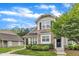 Inviting townhome showcasing manicured landscaping and a charming stone facade at 345 Red Elm Dr, Durham, NC 27713
