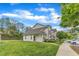 Well-maintained townhome with lush lawn and sidewalk at 345 Red Elm Dr, Durham, NC 27713