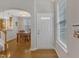 Inviting foyer featuring hardwood floors, natural light, and an open view to the dining area at 345 Red Elm Dr, Durham, NC 27713
