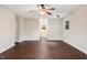 Spacious bedroom featuring wood-look flooring and a ceiling fan at 3518 Donnigale Ave, Durham, NC 27705