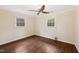 Comfortable bedroom featuring wood-look flooring and a ceiling fan at 3518 Donnigale Ave, Durham, NC 27705