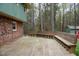 Large outdoor wooden deck with built-in benches perfect for entertaining or relaxing at 3518 Donnigale Ave, Durham, NC 27705