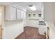 Bright laundry room with abundant storage and white cabinets at 3518 Donnigale Ave, Durham, NC 27705