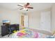 Cozy bedroom featuring a themed bed, ceiling fan, and a window offering a bright space at 4008 Sykes St, Cary, NC 27519