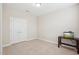This simple bedroom offers ample space with carpeting, closet, and large storage at 4008 Sykes St, Cary, NC 27519