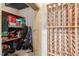 Organized basement storage area with shelves and a custom-built wine rack at 417 Westbury Dr, Chapel Hill, NC 27516