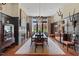 Formal dining room with wainscoting, fireplace and elegant chandelier at 417 Westbury Dr, Chapel Hill, NC 27516
