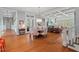 Open-concept dining area with hardwood floors, coffered ceiling, and access to living spaces at 417 Westbury Dr, Chapel Hill, NC 27516