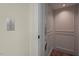 Residential elevator interior with paneled walls, carpeting, and a call button for easy access to different floors at 417 Westbury Dr, Chapel Hill, NC 27516