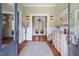 Elegant foyer with hardwood floors, wainscoting, and stylish decor at 417 Westbury Dr, Chapel Hill, NC 27516