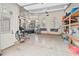 Bright and airy garage with ample storage and space for multiple vehicles, complete with organized shelving at 417 Westbury Dr, Chapel Hill, NC 27516