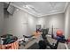 Well-lit home gym with exercise equipment, a television, and workout accessories at 417 Westbury Dr, Chapel Hill, NC 27516