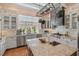 Bright kitchen featuring stainless steel appliances, granite countertops, and a window view at 417 Westbury Dr, Chapel Hill, NC 27516