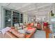 Cozy living room featuring a fireplace, built-in shelving, and an open floor plan at 417 Westbury Dr, Chapel Hill, NC 27516