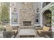 Exterior fireplace with outdoor seating, perfect for relaxing and entertaining at 417 Westbury Dr, Chapel Hill, NC 27516