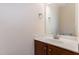 Clean bathroom features a vanity with a white countertop and a mirror, offering functionality at 452 Panorama Park Pl, Cary, NC 27519