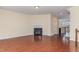 Inviting living room featuring a fireplace, hardwood floors, and neutral wall paint at 452 Panorama Park Pl, Cary, NC 27519