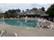 Large community pool with sun loungers and chairs, near the clubhouse, offers a relaxing outdoor space at 452 Panorama Park Pl, Cary, NC 27519