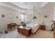A spacious bedroom featuring a canopy bed and a bright, open atmosphere at 4712 Bright Pebble Ct, Raleigh, NC 27604