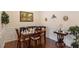 Elegant dining room with decorative trim, hardwood floors, and a charming ambiance at 4712 Bright Pebble Ct, Raleigh, NC 27604