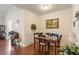 Cozy dining area with hardwood floors, decorative trim, and ample natural light at 4712 Bright Pebble Ct, Raleigh, NC 27604
