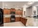 Well-equipped kitchen with granite countertops, stainless steel appliances, and ample cabinet space at 4712 Bright Pebble Ct, Raleigh, NC 27604