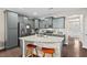 Well-equipped kitchen featuring a center island, stainless appliances, and ample cabinet space at 5 Galway Glenn Ln, Durham, NC 27705