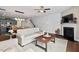 Open concept living room, fireplace, and hardwood floors at 5 Galway Glenn Ln, Durham, NC 27705