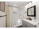Bright bathroom features a tiled shower and modern fixtures at 5013 Green Oak Dr, Durham, NC 27712
