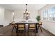 Dining room featuring modern chandelier and wood trim at 5013 Green Oak Dr, Durham, NC 27712