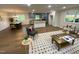 Open-concept living and dining area with hardwood floors, neutral walls, and lots of natural light at 5013 Green Oak Dr, Durham, NC 27712