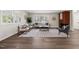 Bright living room with a brick fireplace and lots of natural light at 5013 Green Oak Dr, Durham, NC 27712