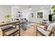 Bright living room with modern decor, hardwood floors, and comfortable seating at 506 N Greensboro St # Apt 33, Carrboro, NC 27510