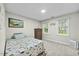 Bright bedroom featuring carpet flooring, natural light, and cheerful decor at 5109 Windance Pl, Holly Springs, NC 27540