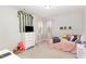 Bedroom featuring decor accents, ample natural light, and cozy decor elements at 5180 Glen Creek Trl, Garner, NC 27529