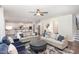 Spacious open-concept living room, flowing seamlessly into the kitchen and dining areas, perfect for entertaining at 5180 Glen Creek Trl, Garner, NC 27529