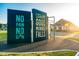 Playground sign with inspiring messages, set near a bright, sunny residential area at 540 Folk Song Way, Wendell, NC 27591