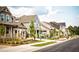 Charming street view with well-maintained homes and sidewalks, landscaped with young trees along a quiet street at 540 Folk Song Way, Wendell, NC 27591