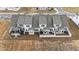 Aerial view of a community featuring townhomes with private fenced backyards and patios at 53 Whitley Ridge Dr, Clayton, NC 27527