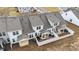 Aerial shot of townhomes highlighting fenced backyards and covered patios at 53 Whitley Ridge Dr, Clayton, NC 27527