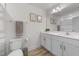 Updated bathroom features a modern vanity, quartz counters, and neutral accents at 53 Whitley Ridge Dr, Clayton, NC 27527