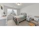 Charming bedroom with a metal bed frame and natural light from nearby windows at 53 Whitley Ridge Dr, Clayton, NC 27527
