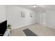 Finished bonus room features neutral walls and carpet and natural light at 53 Whitley Ridge Dr, Clayton, NC 27527