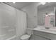 A full bathroom featuring shower, toilet, vanity with basin and mirror, and neutral walls at 5432 Crescent Square St, Raleigh, NC 27616