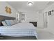 Serene bedroom with a comfortable bed and soft, natural lighting at 5432 Crescent Square St, Raleigh, NC 27616