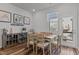 Cozy dining room area with wood flooring and natural light at 5432 Crescent Square St, Raleigh, NC 27616