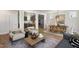 Open-concept living area seamlessly connects the dining and kitchen spaces, ideal for entertaining at 548 Folk Song Way, Wendell, NC 27591