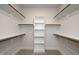 Spacious walk-in closet with ample shelving and hanging space for organized storage at 548 Folk Song Way, Wendell, NC 27591
