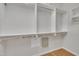 Walk-in closet with custom shelving and hanging rods, offering ample storage and organization at 563 Tomkins Loop, Cary, NC 27519